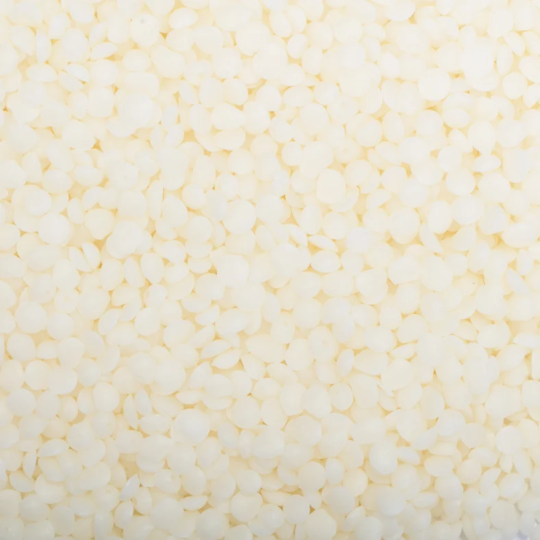 Close-up of cream-colored Freedom Soy Wax beads