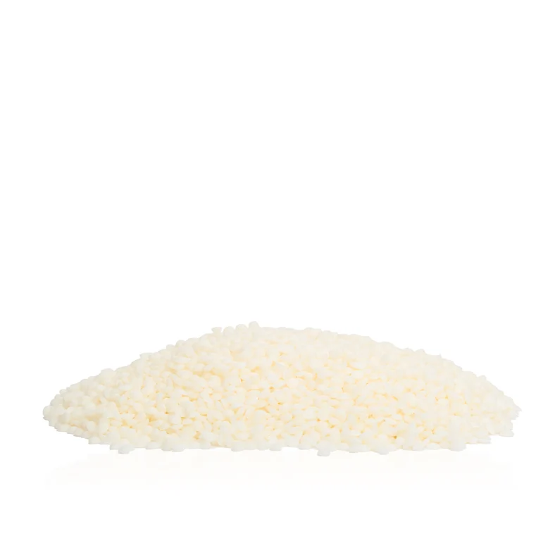 Pile of Freedom Soy Wax beads on a white background